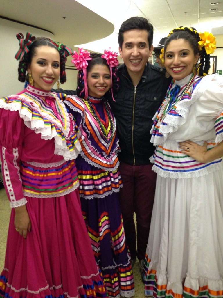 Andrés with Quetzales dancers